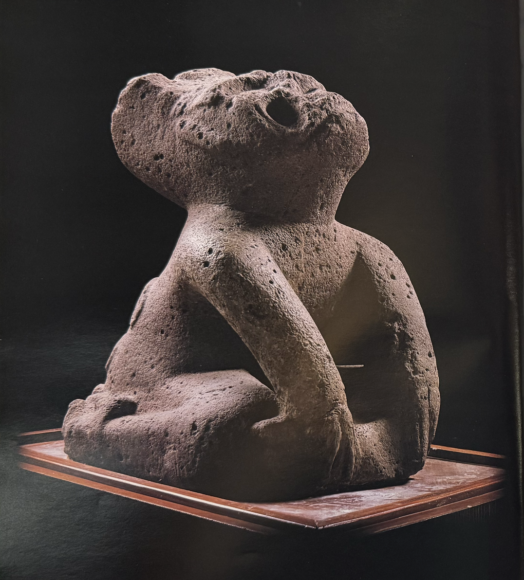 La Venta Monument 11, seated were-jaguar figure in basalt